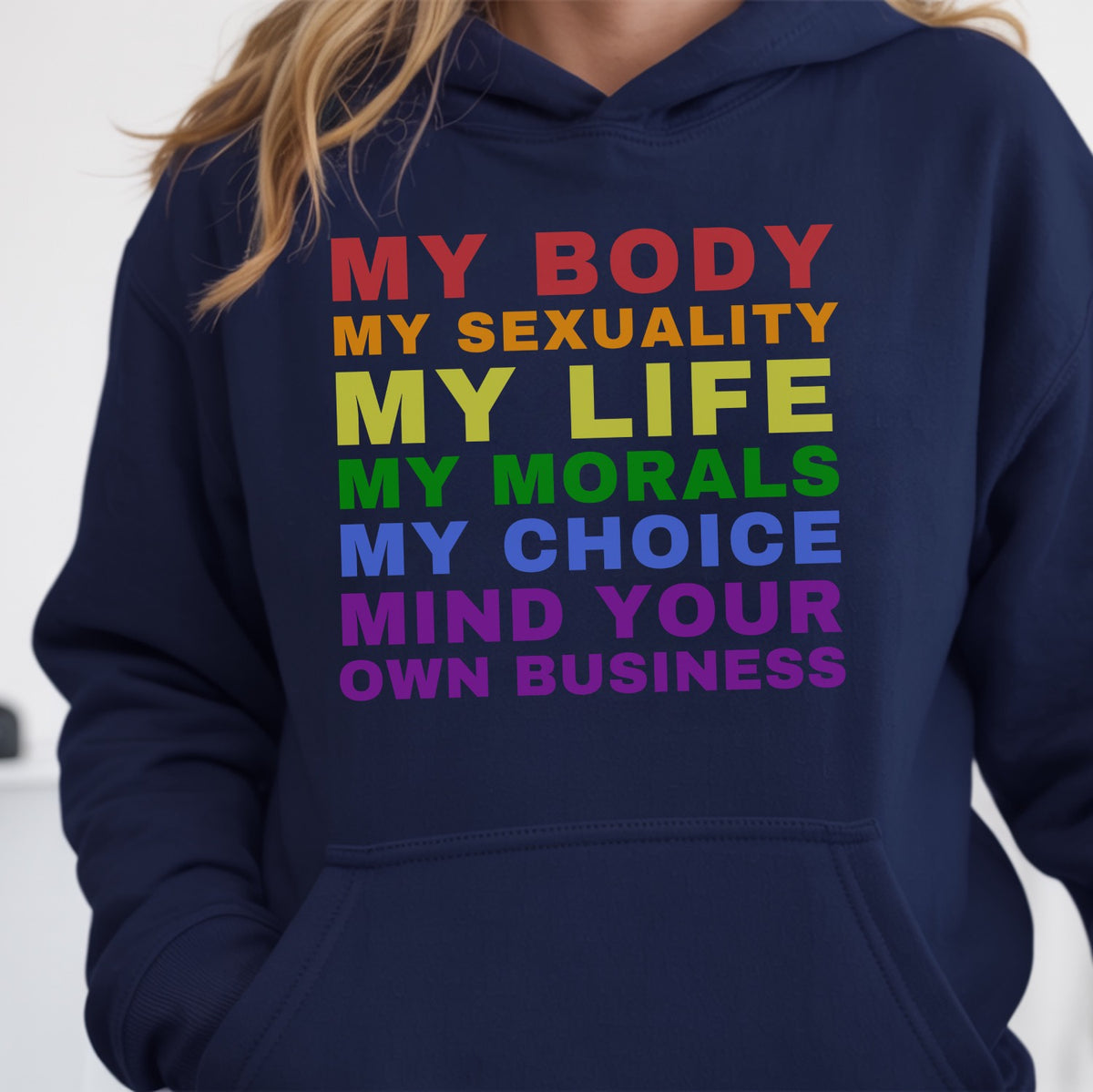 Navy blue hoodie with colorful lgbtq rainbow text message on a white background