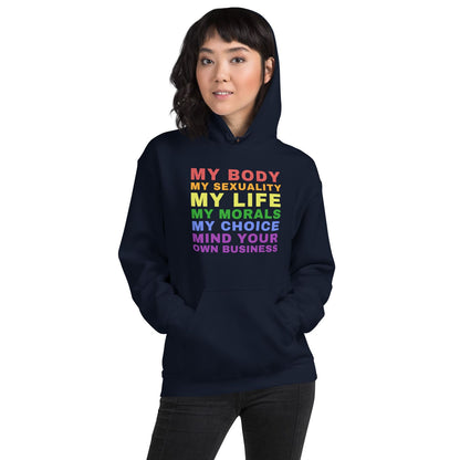 Person wearing a navy hoodie with colorful rainbow lgbt text on a white background
