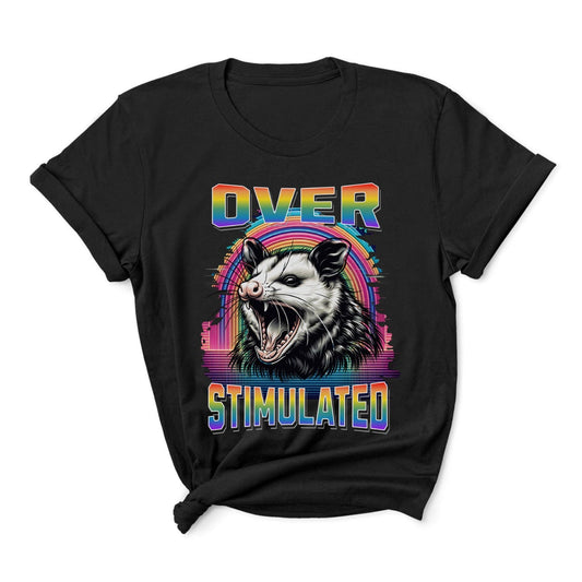 Black t-shirt with a graphic of an opossum and rainbow text on a white background: Subtle LGBT Overstimulated Shirt, Unhinged Opossum Gay Pride Tee, Queer Neurodivergent T-Shirt, Neurospicy Gift For Autistic ADHD AUDHD
