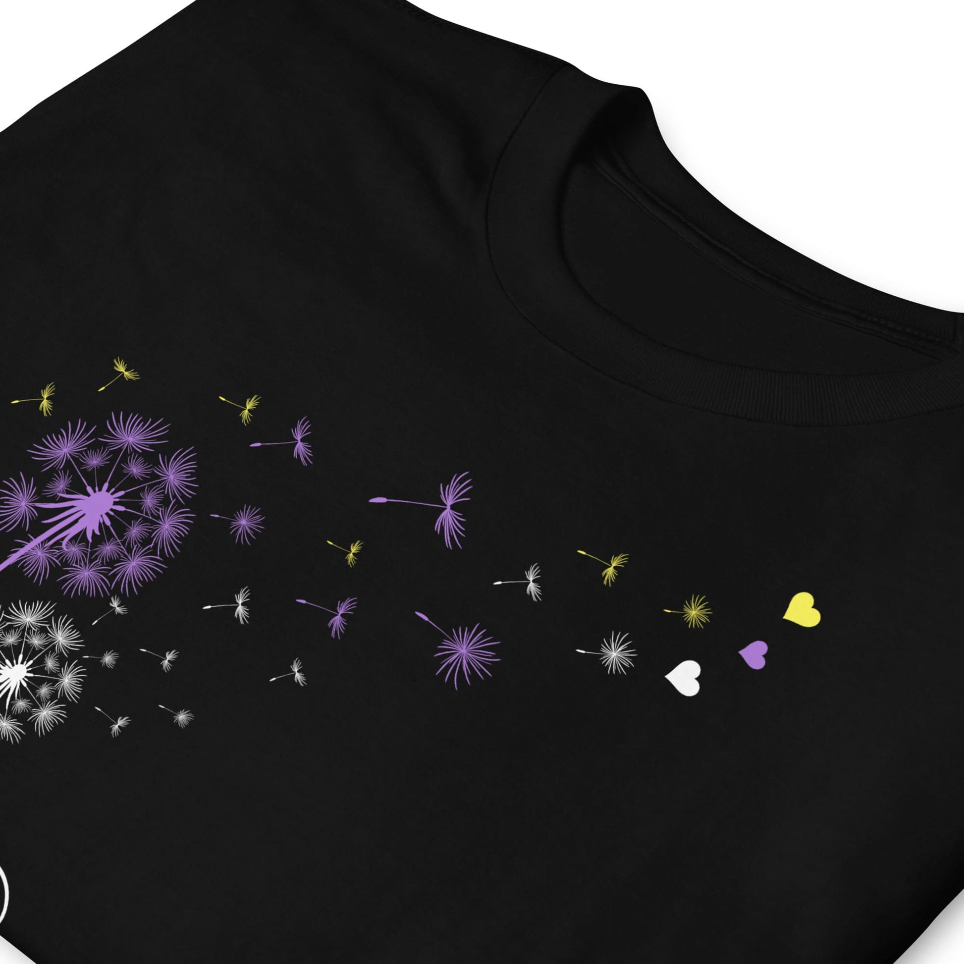Black t-shirt with colorful dandelion seed designs on a white background