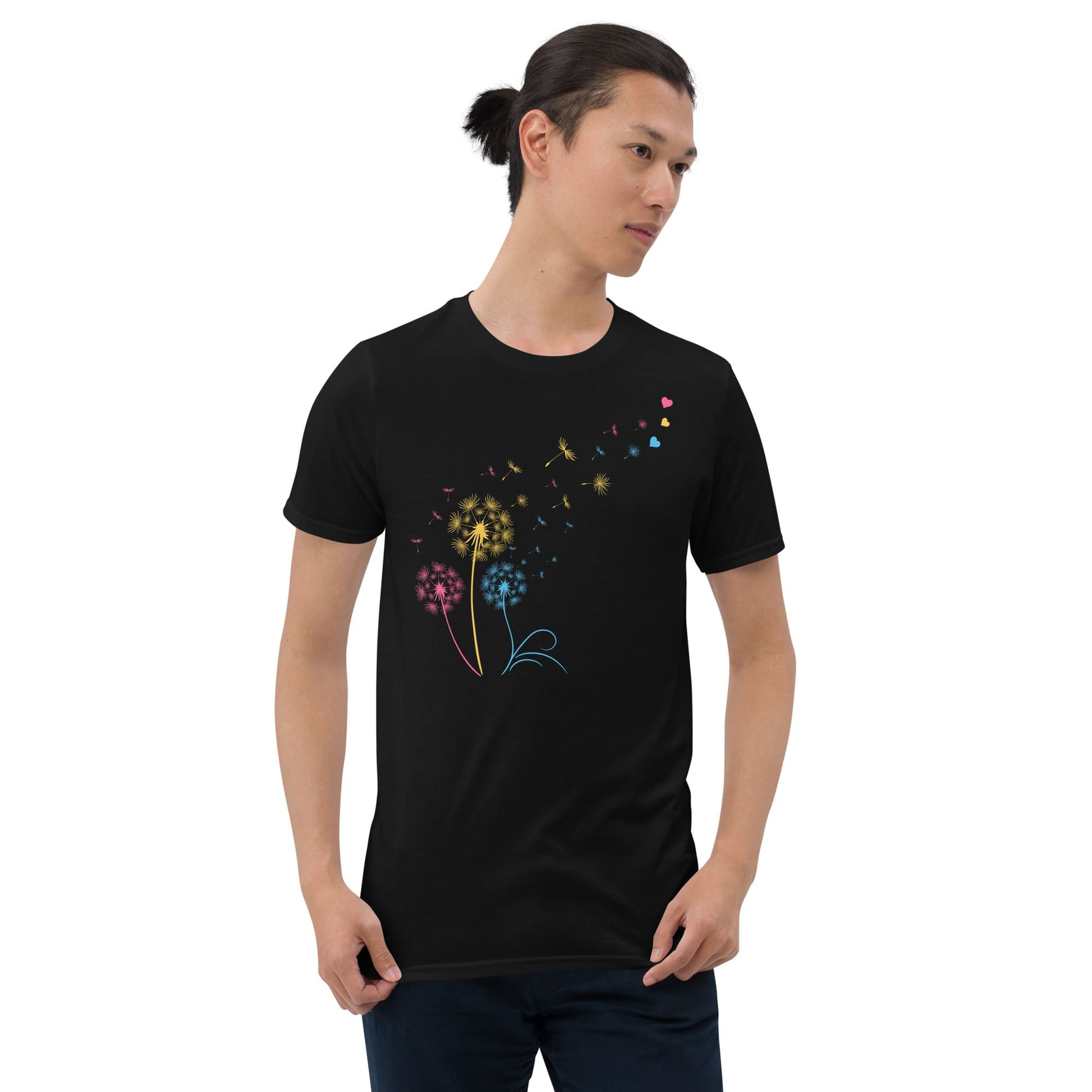 Person wearing a black t-shirt with colorful dandelion design on a white background