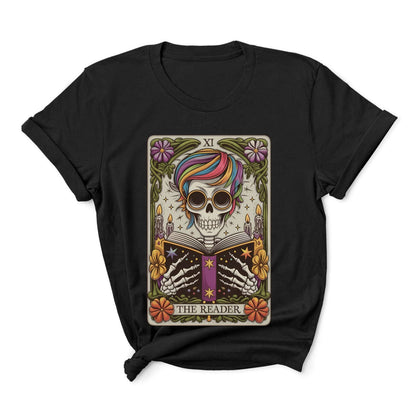 Black t-shirt with a colorful skull and book design on a white background: The Reader Skeleton Shirt, Tarot Card Bookish Halloween Tee, Subtle Pride Rainbow Seasonal T-Shirt, Mystical Gay Queer Spooky Reading Gift