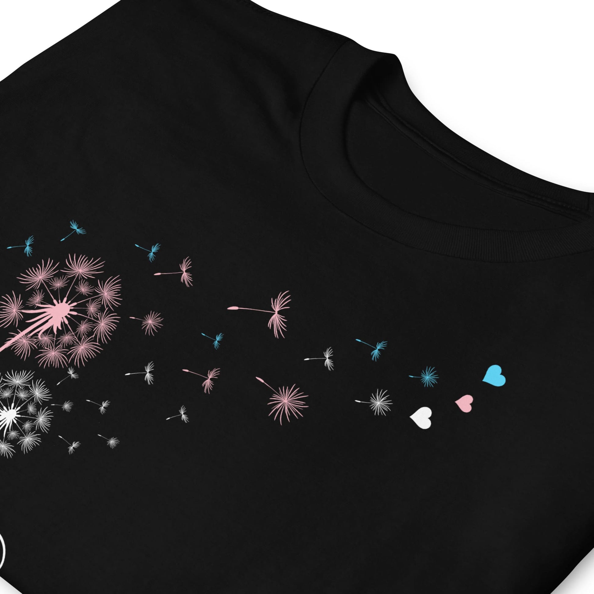 Black t-shirt with colorful dandelion seed designs on a white background