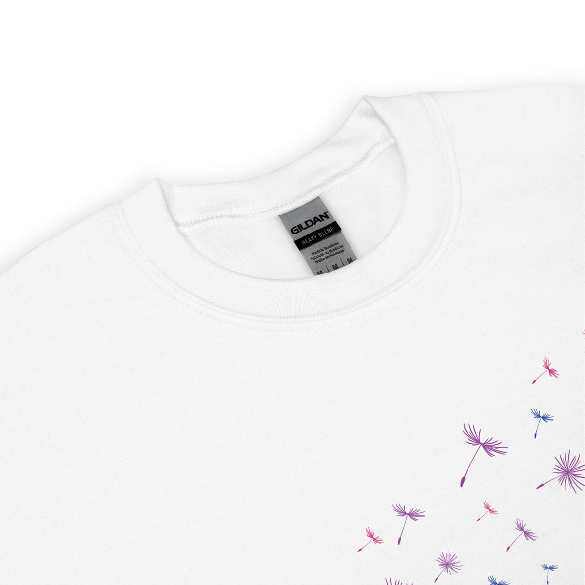 Detail of bisexual sweatshirt with floral patterns on a white background