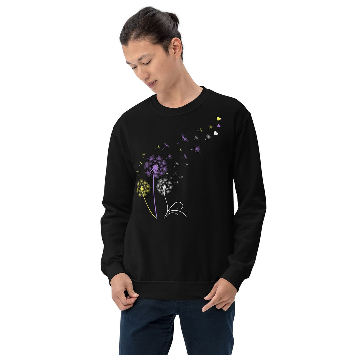 Person wearing a black nonbinary sweatshirt with floral design on a white background