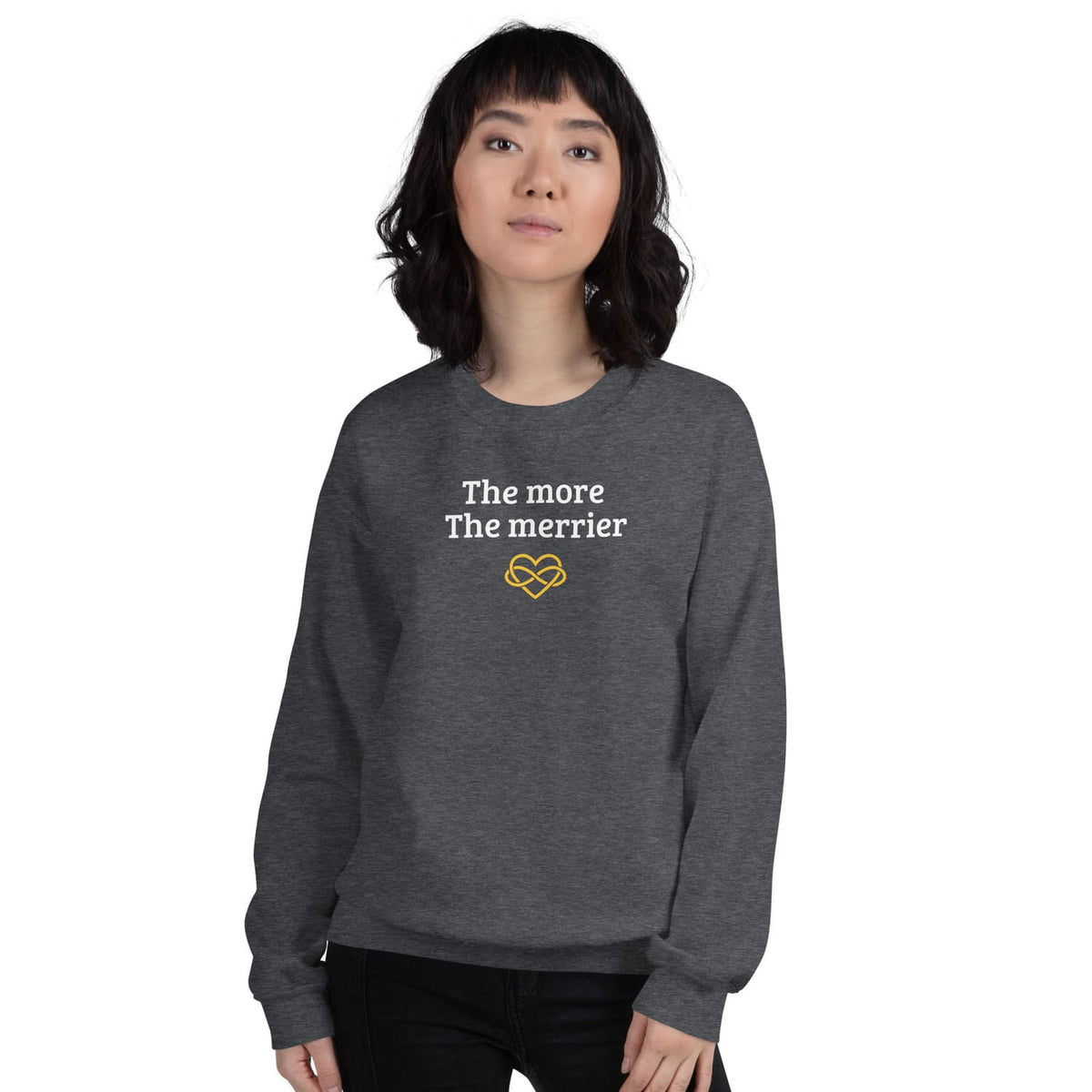 Person wearing a dark gray polyamory sweatshirt with text and logo on a white background