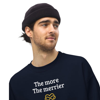 Man wearing a black beanie and a black polyamory sweatshirt with 'The more The merrier' text.
