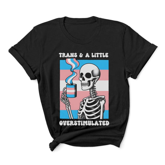 Black t-shirt with a skeleton holding a coffee cup and text 'Trans & A Little Overstimulated' on a white background: Transgender Anxiety Shirt, Overstimulated Tee, Mental Health T-Shirt, Trans Pride Skeleton Shirt, Sarcastic Neurospicy Gift For MTF Or FTM