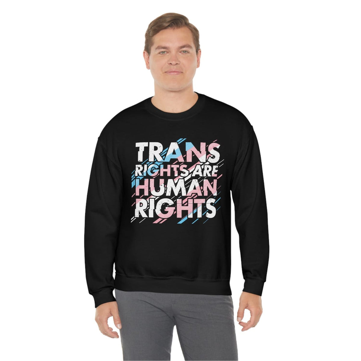 FTM transgender  wearing a black sweatshirt with 'TRANS RIGHTS ARE HUMAN RIGHTS' text on a white background