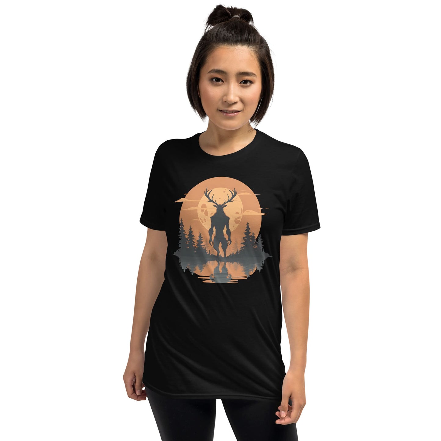 Person wearing a black t-shirt with a graphic design of wendigo and trees.