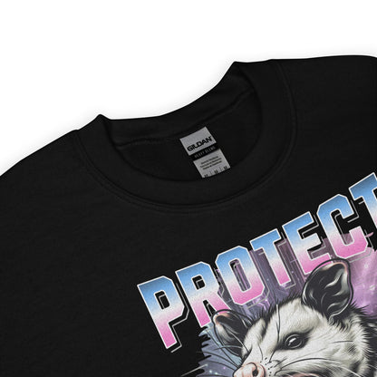 Black sweatshirt with an opossum graphic and 'PROTECT transgender kids' text on a white background