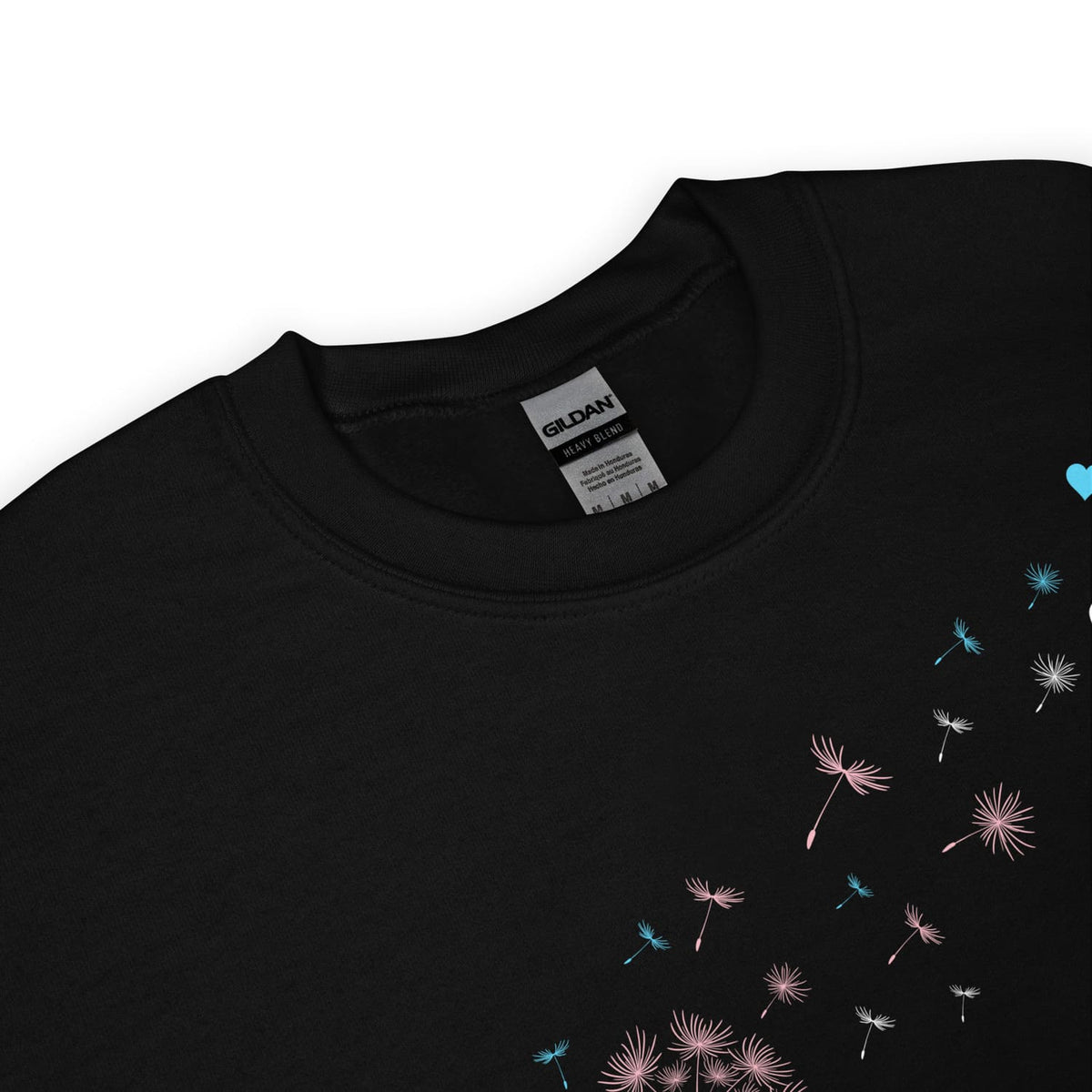 Black transgender sweatshirt with floral designs on a white background, detail 